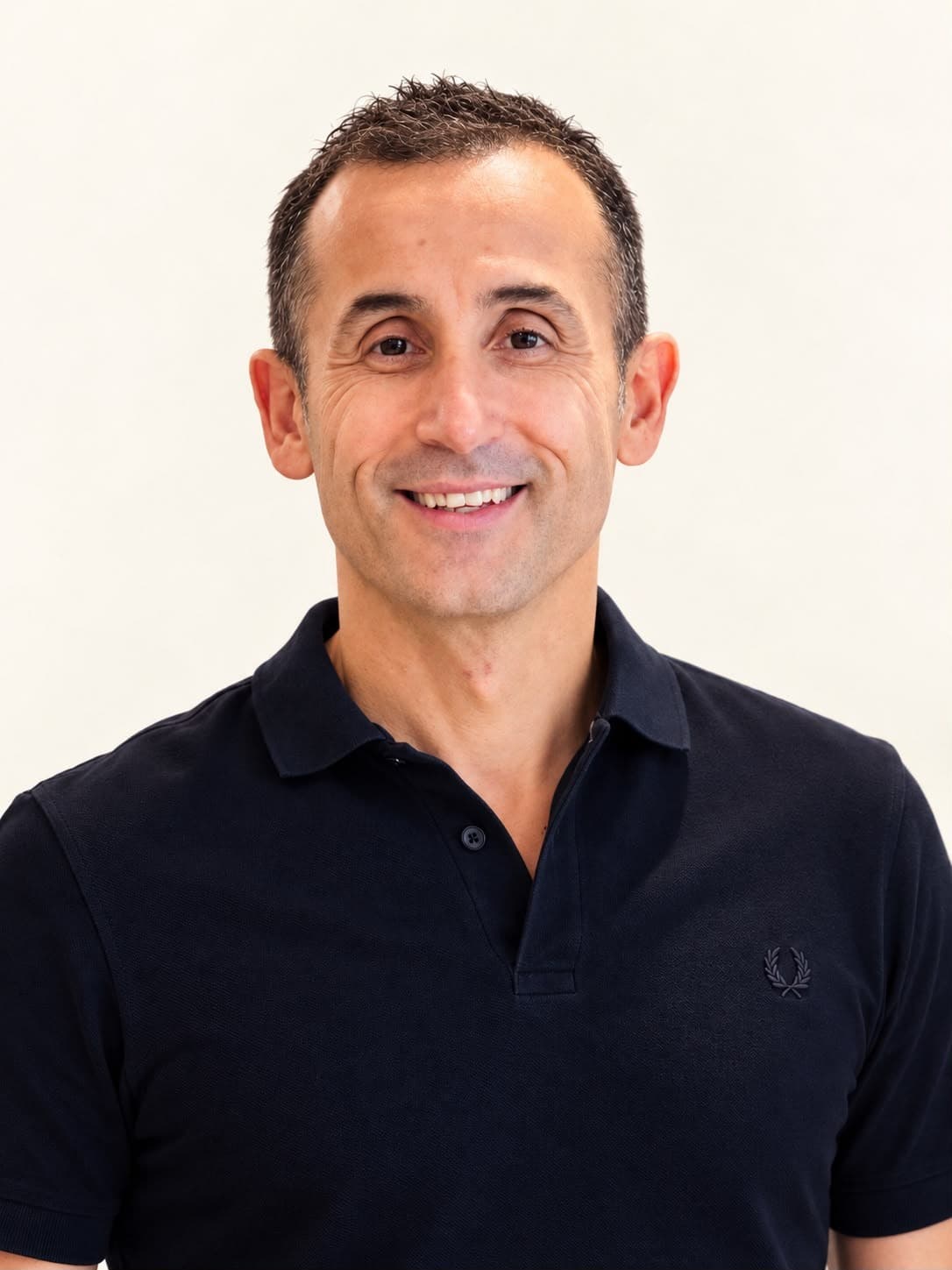 Portrait of Bülent (Bill), master colourist at Megas Hair Salon, Coquitlam