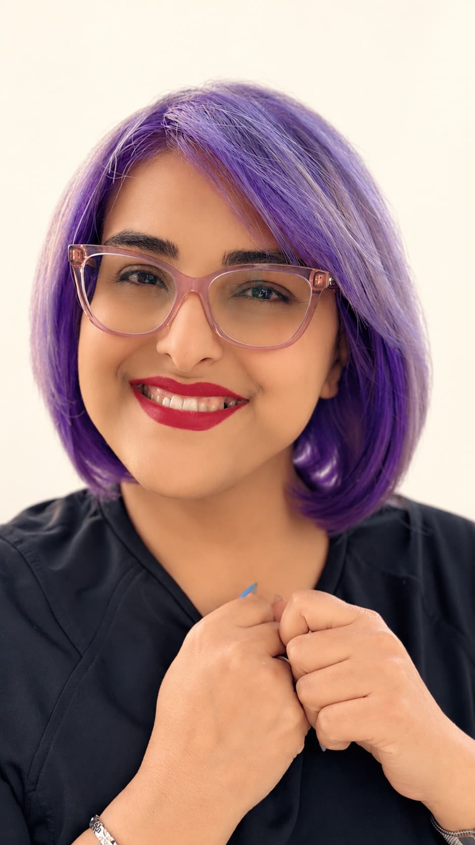 Portrait of Fara, senior stylist at Megas Hair Salon, Coquitlam