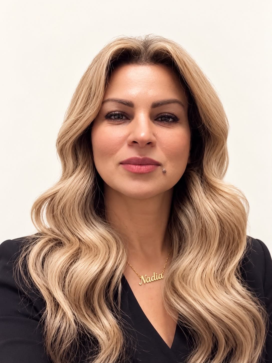 Portrait of Nadia, senior stylist at Megas Hair Salon, Coquitlam